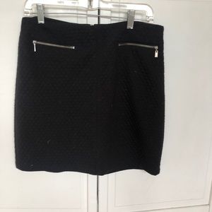 Warm quilted mini skirt with sexy zippers
